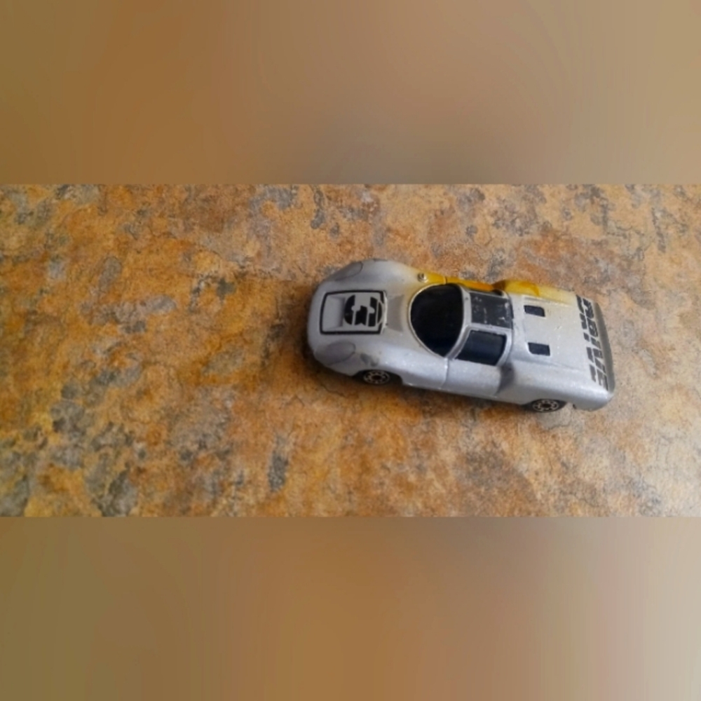 Porsche Die-Cast Silver Sports Car 1985 minor imperfections on paint